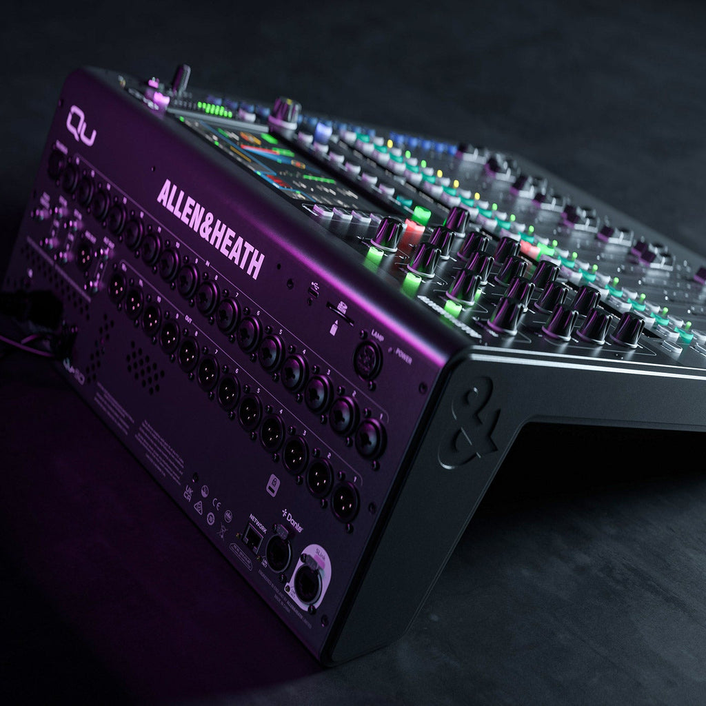 Allen & Heath Qu-5 digital mixer with multiple input channels and control knobs, front view showing interface and display.