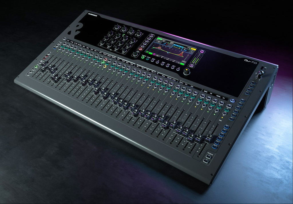 Allen & Heath Qu-7D digital mixer with touchscreen interface and multiple input channels, shown on a banner display.