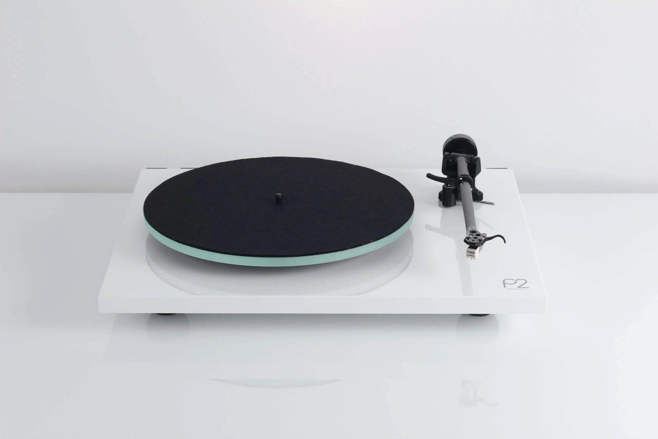 Rega Planar 2 turntable with Nd3 cartridge, featuring a sleek design and tonearm, perfect for high-quality vinyl listening.