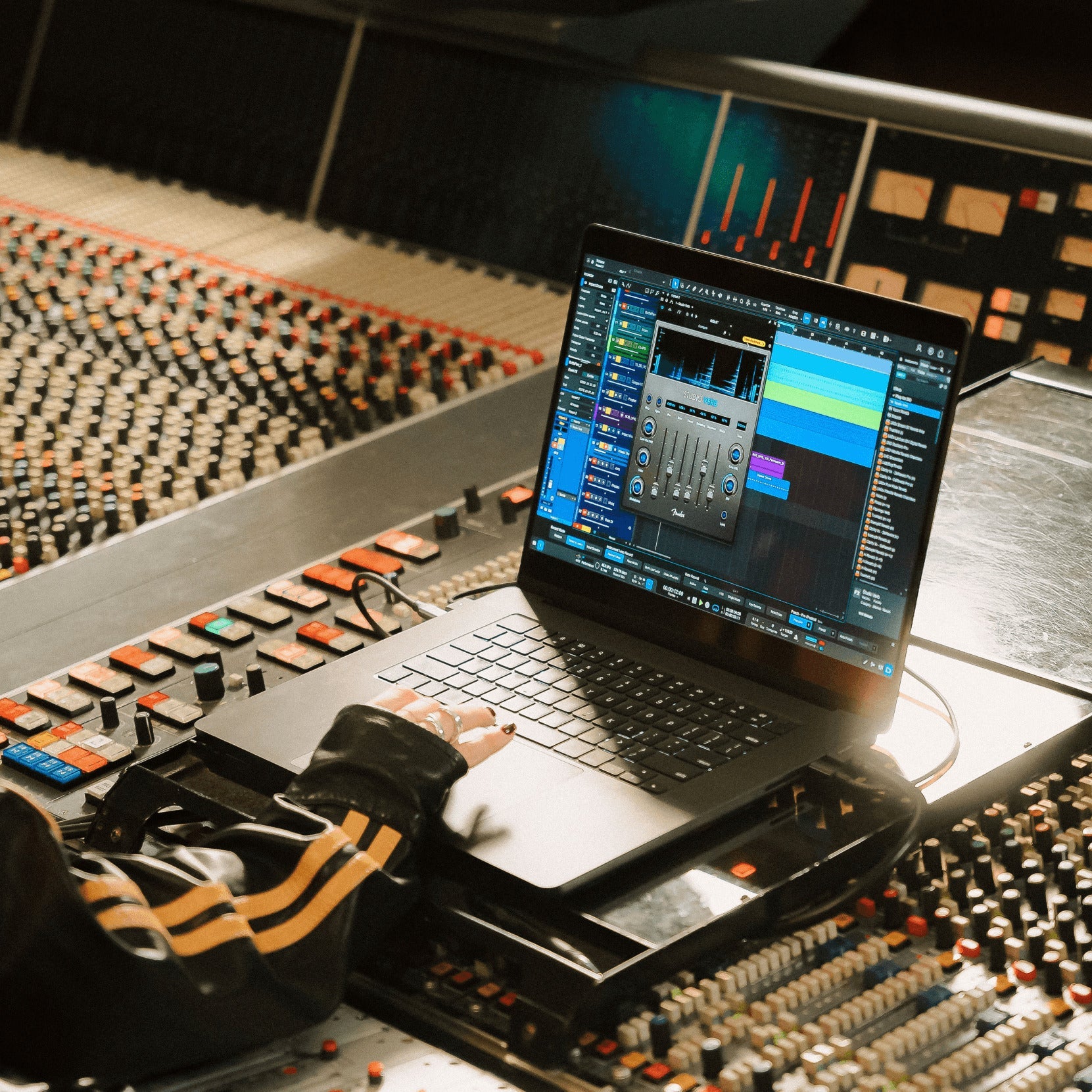 Fender Studio Pro (Student) DAW software box with audio interface and keyboard controller for music production.