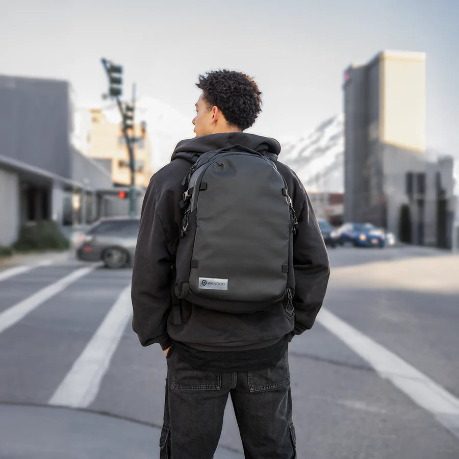 Wandrd Stratus Photo 18L black video equipment bag with padded compartments and durable exterior for camera gear storage.
