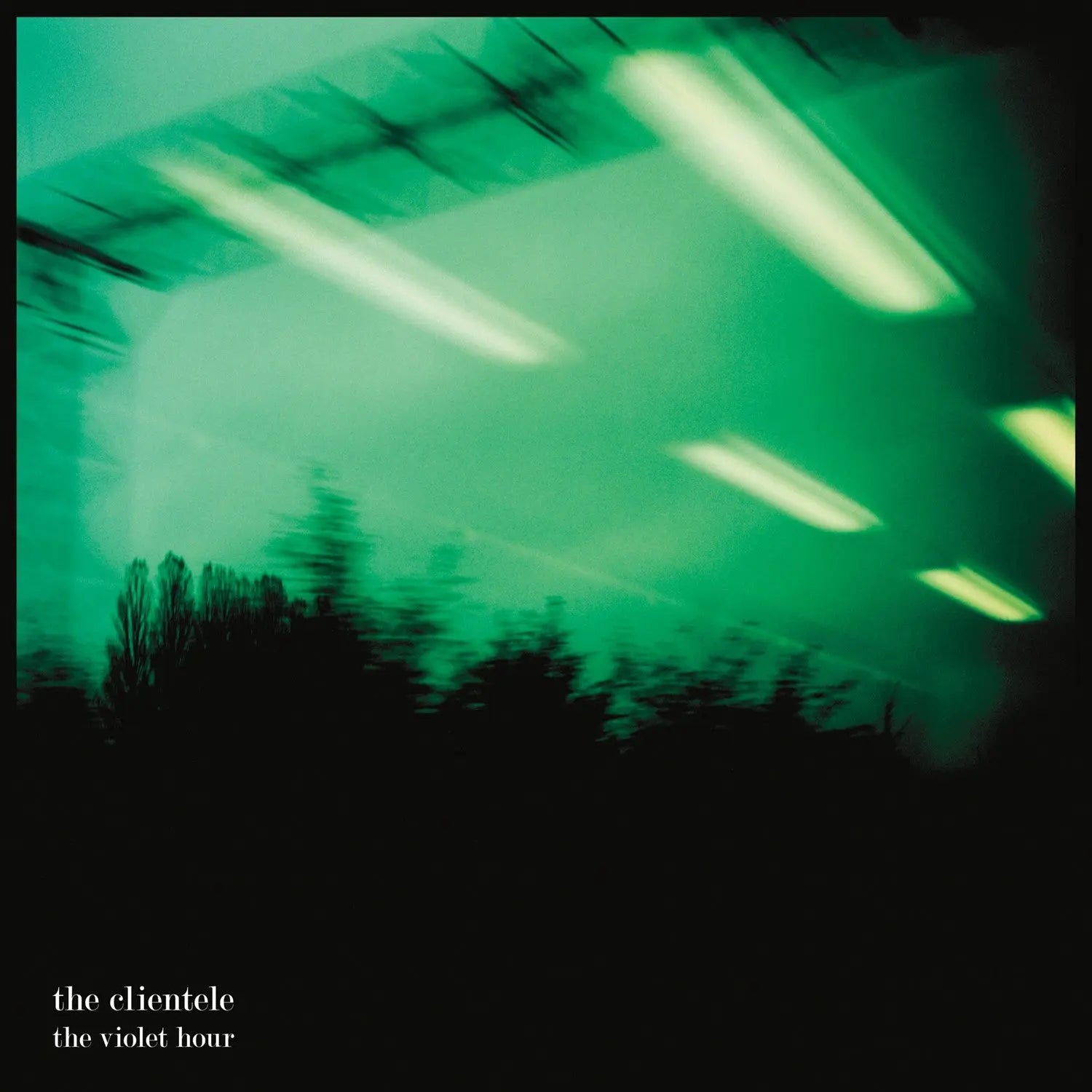 Black vinyl LP of The Clientele's The Violet Hour, featuring cover art with a minimalistic design, by Merge Records.