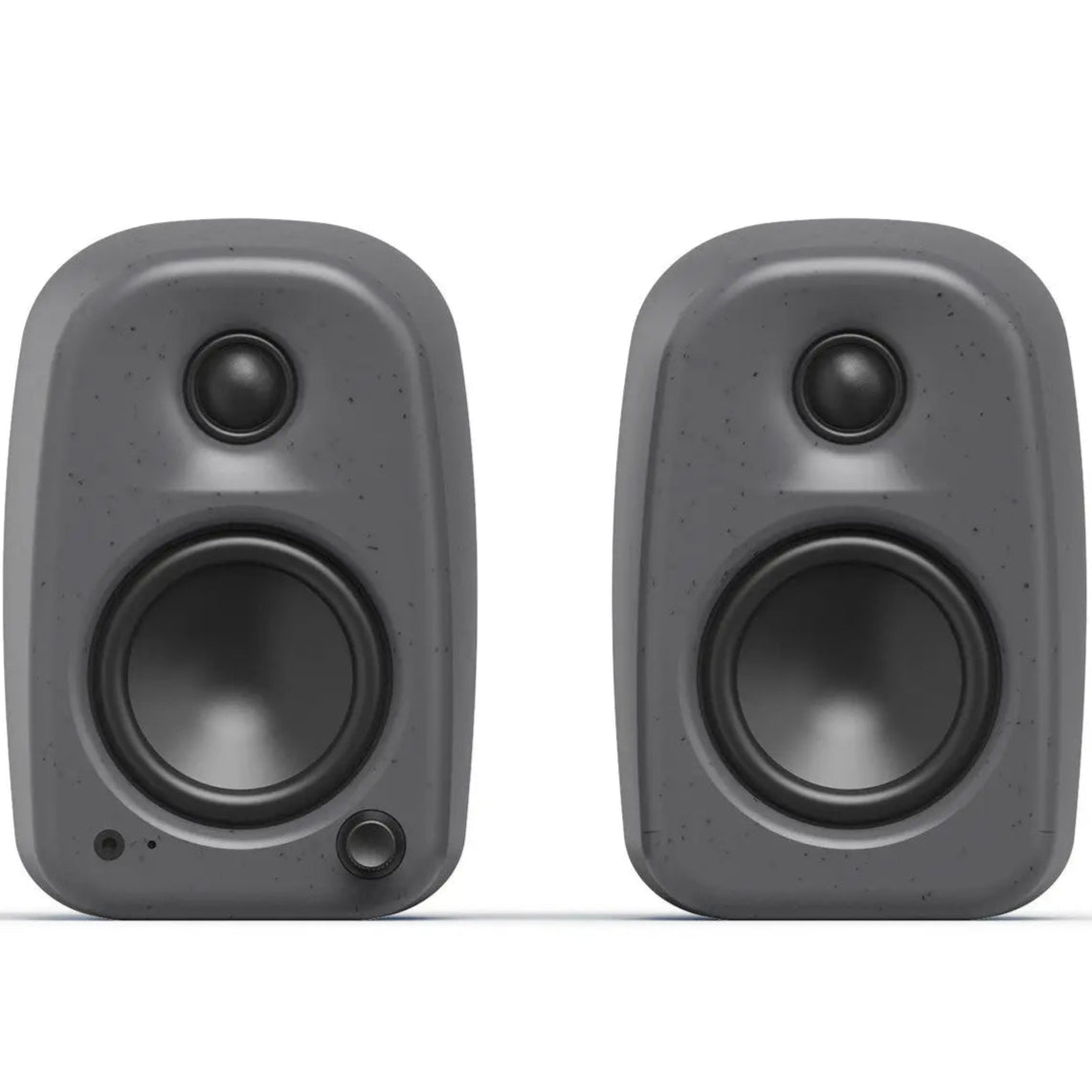 Kanto Audio UKI desktop speakers shown from the front, with a sleek black design and compact rectangular shape.