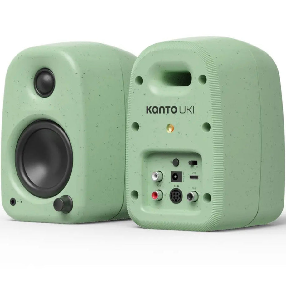 Kanto Audio UKI desktop speakers shown from dual perspectives, featuring sleek design and compact size for desktop audio setup.