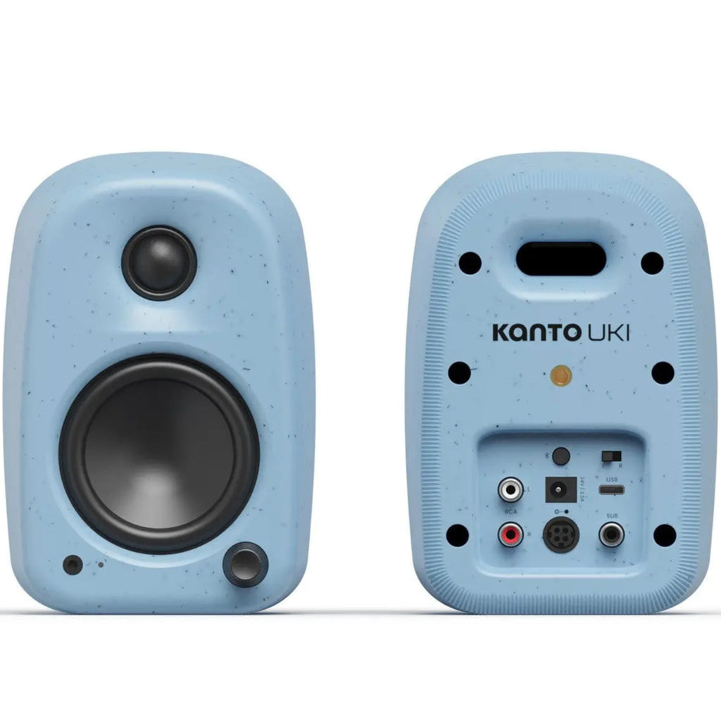 Kanto Audio UKI desktop speakers with dual drivers and sleek black finish, designed for high-quality desktop audio.
