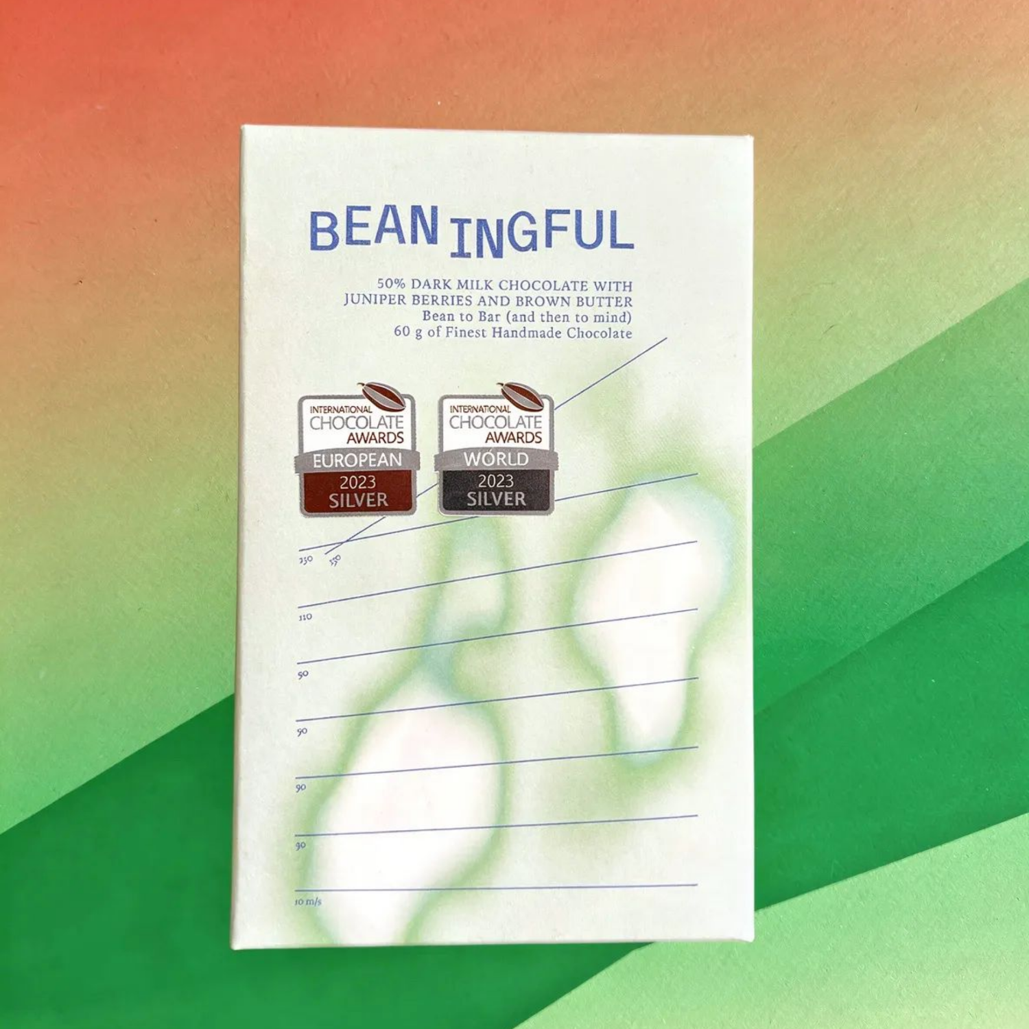 Beaningful dark milk chocolate with 50% cocoa, infused with juniper and brown butter, shown in a 60g bar.