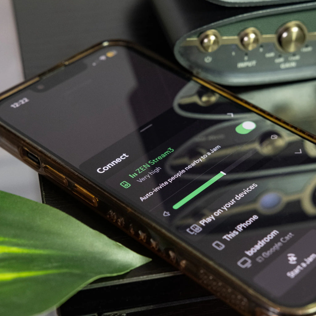 iFi Audio ZEN Stream 3 music streamer with sleek design and front display, showcasing connectivity ports and control buttons.