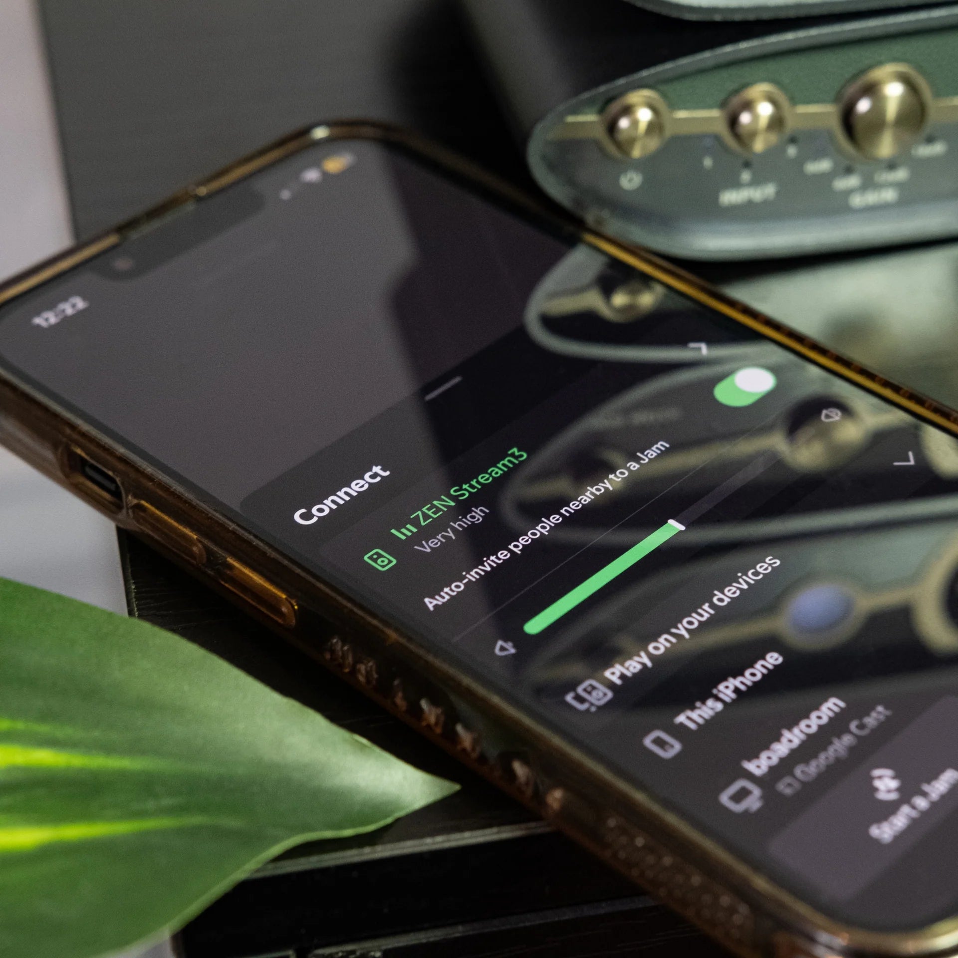 iFi Audio ZEN Stream 3 music streamer with sleek design and front display, showcasing connectivity ports and control buttons.