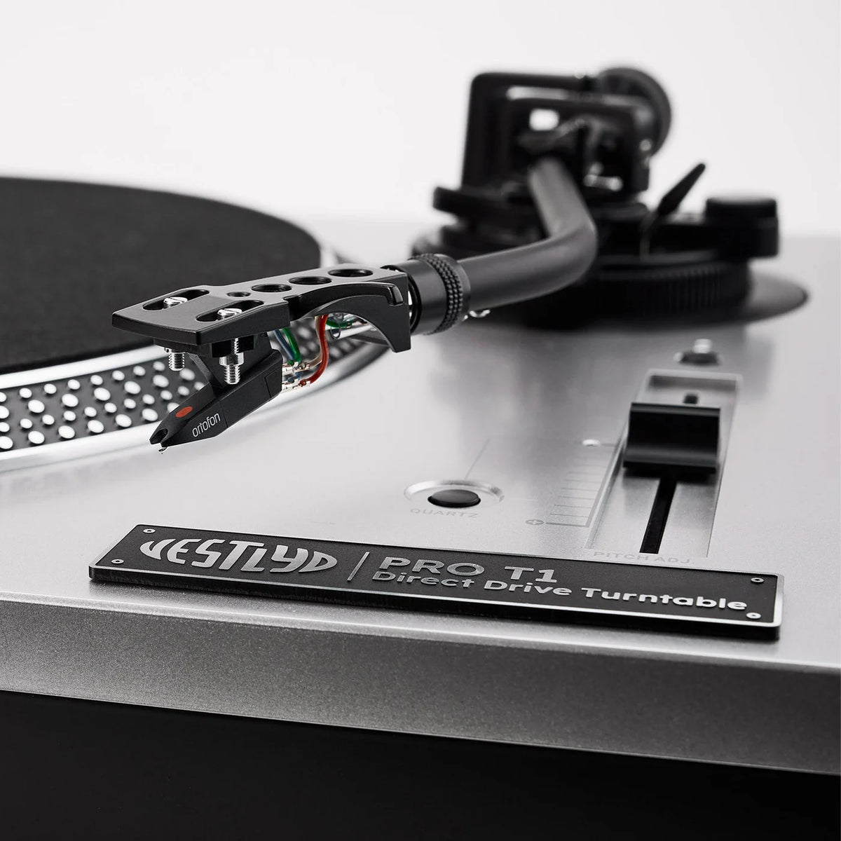 Vestlyd Vestlyd Pro T1 DJ turntables with sleek black design, featuring tonearm and control buttons for professional audio mixing.