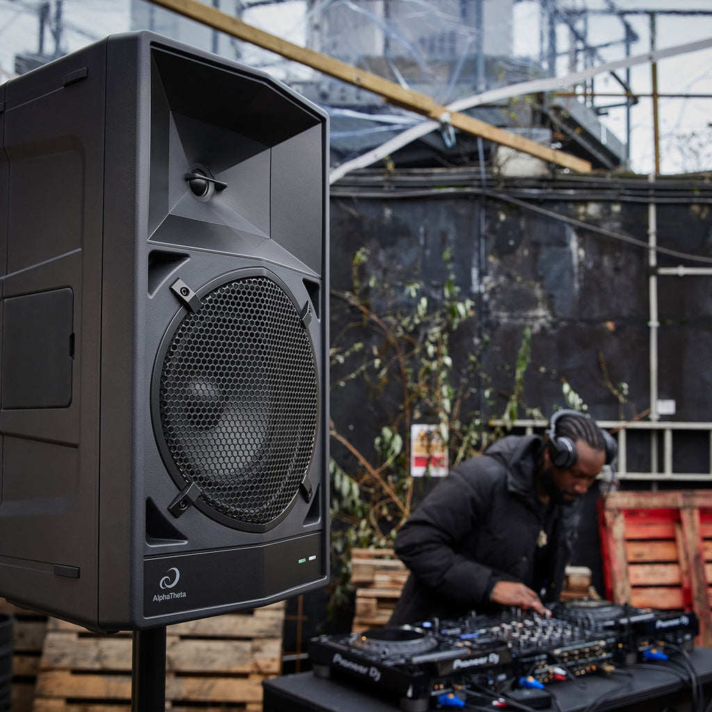 AlphaTheta Wave-Eight battery-powered loudspeakers with sleek design and control panel, ideal for portable audio needs.