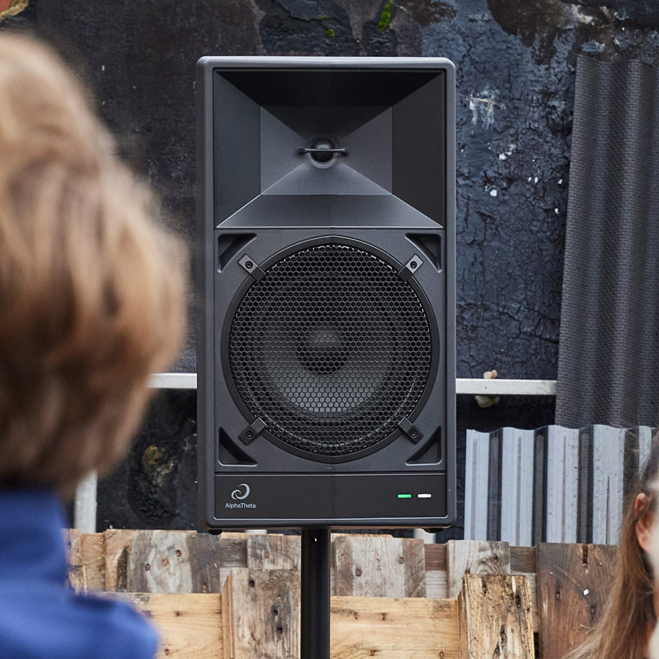AlphaTheta Wave-Eight battery-powered loudspeakers with sleek design and control panel, suitable for portable audio needs.
