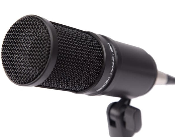 Zoom ZDM-1 dynamic microphone shown with a sleek black body and grille, ideal for professional sound recording and live performances.