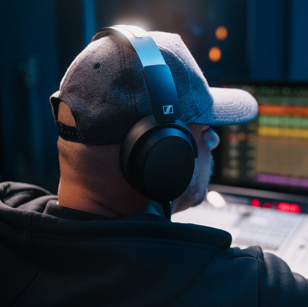 Sennheiser HD 480 Pro Plus studio headphones with over-ear design, black ear cups, and adjustable headband for professional audio.