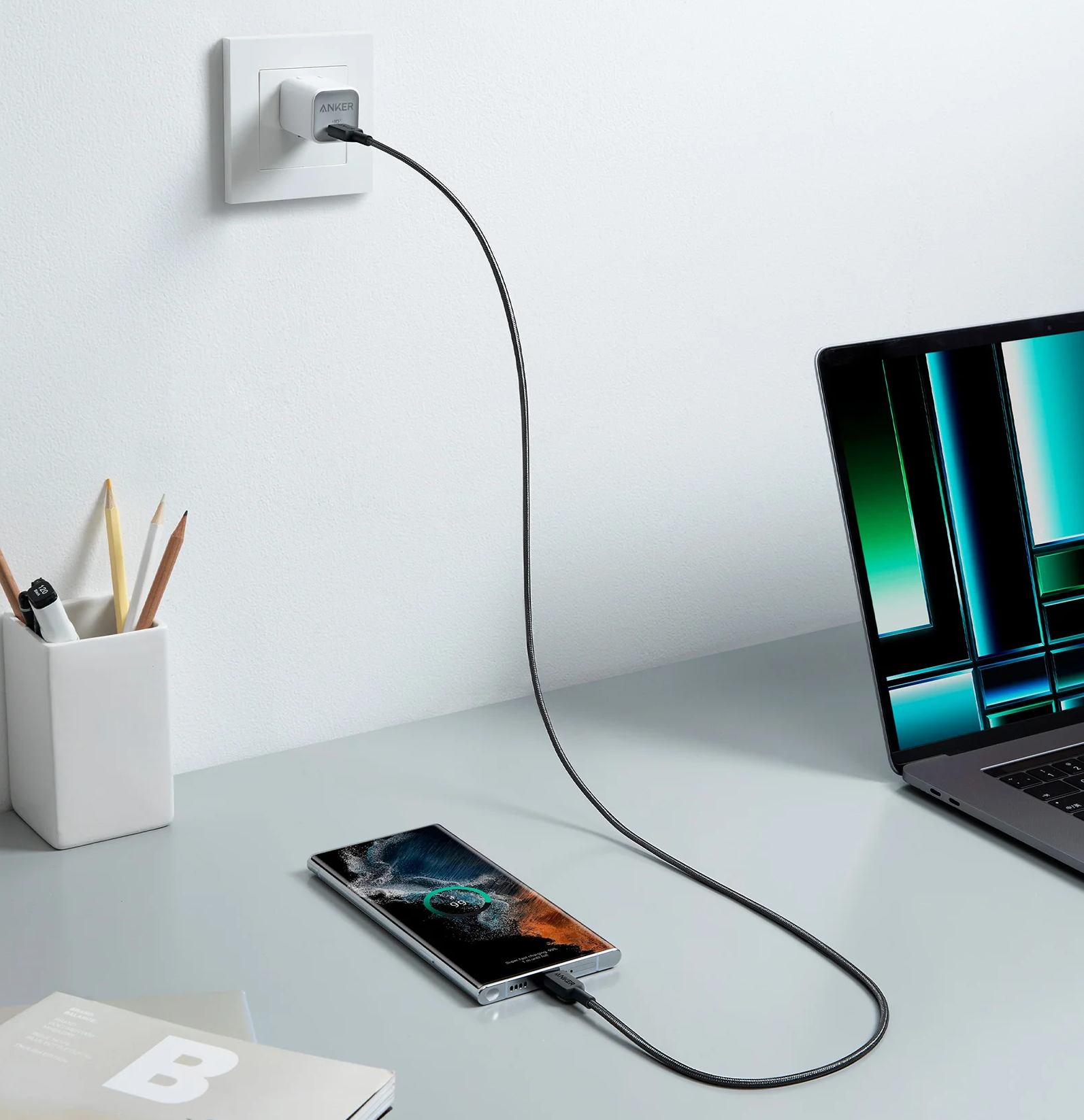 Anker USB-C to USB-C cable, 1.8 meters long, black, with reinforced connectors for durable charging and data transfer.