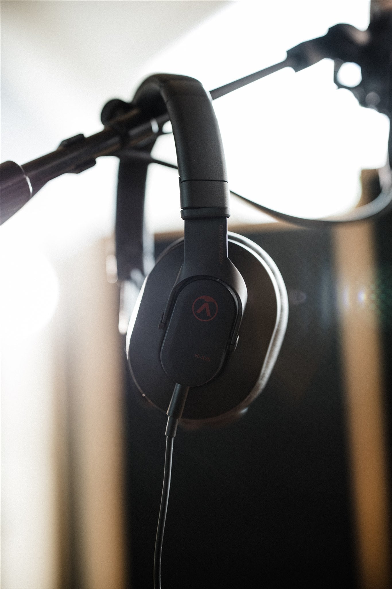 Austrian Audio Hi-X20 studio headphones in black with cushioned ear cups and adjustable headband, designed for professional audio monitoring.