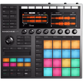 Native Instruments Maschine+ drum machine and sampler with colorful control pads and built-in screen, ready for music production.