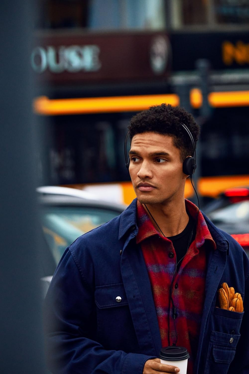 AIAIAI Tracks wired headphones in black, lifestyle street scene