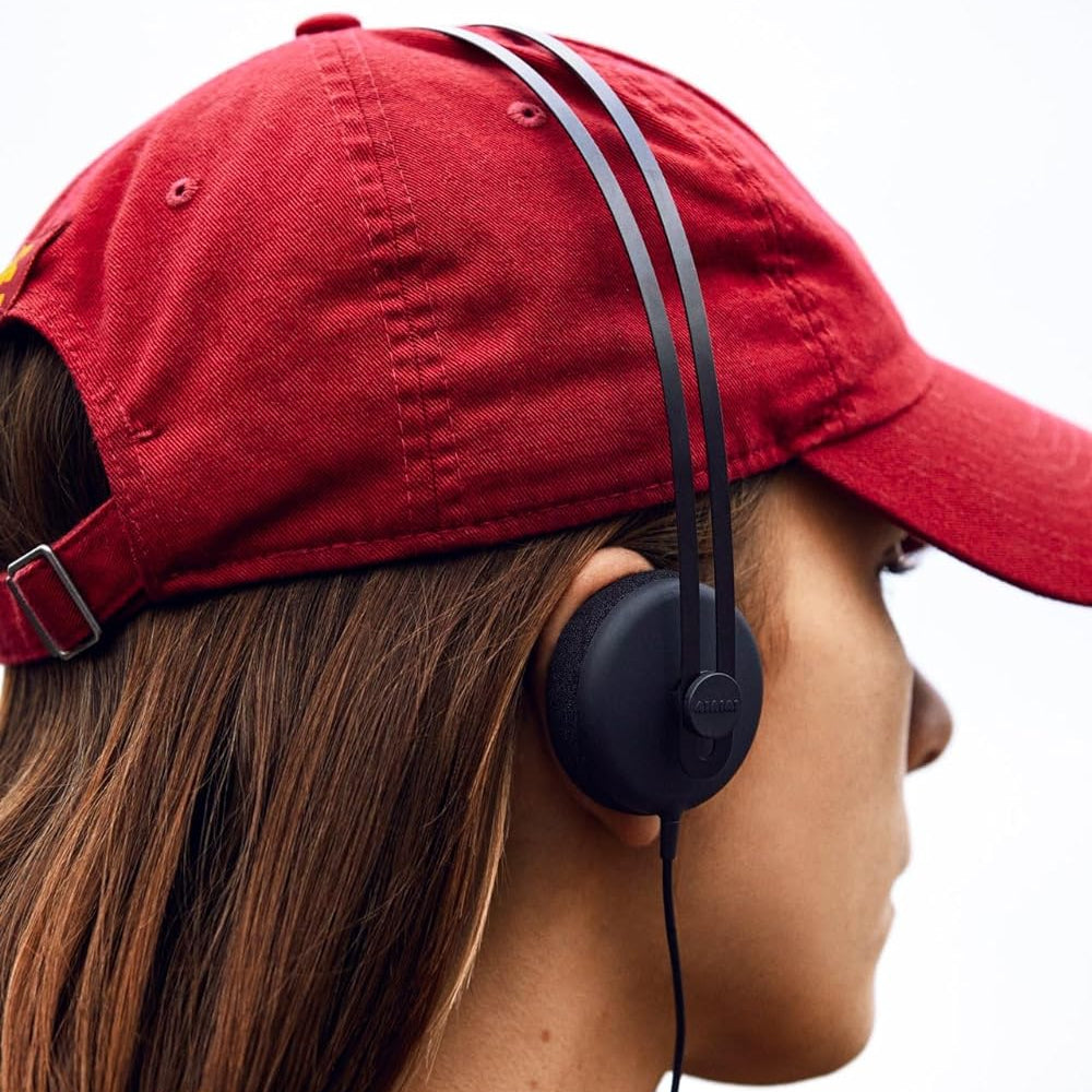 AIAIAI Tracks wired headphones in black, lifestyle worn