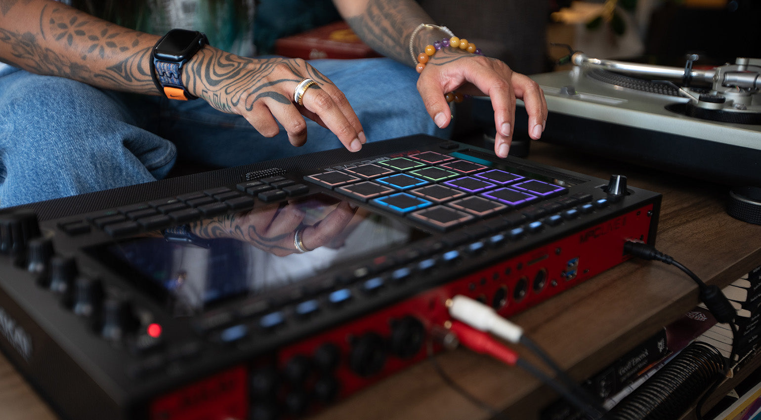 Akai Professional MPC Live III drum machine and sampler with touchscreen interface and portable design.