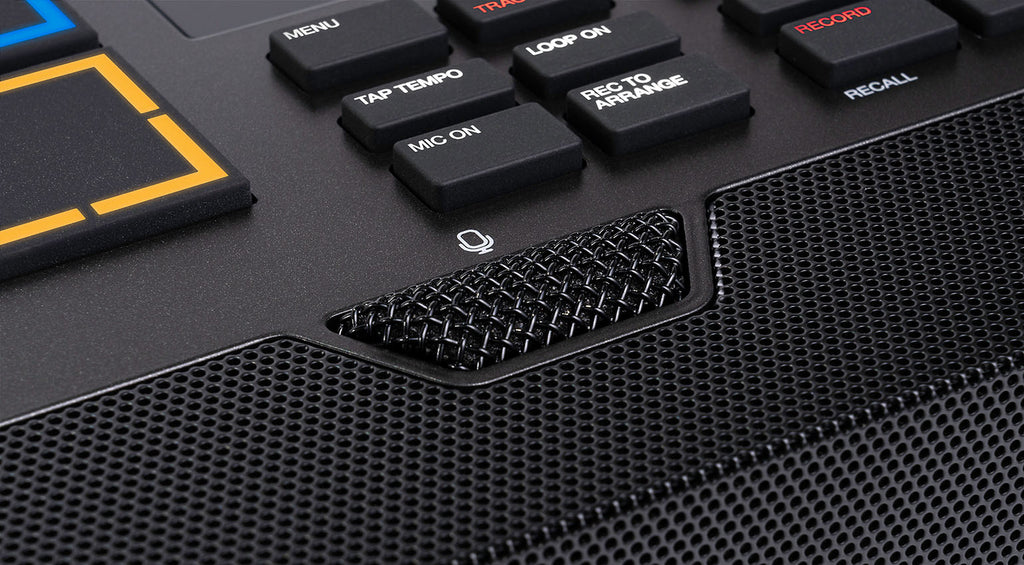 Akai Professional MPC Live III drum machine and sampler with microphone, featuring a sleek control surface and built-in display.