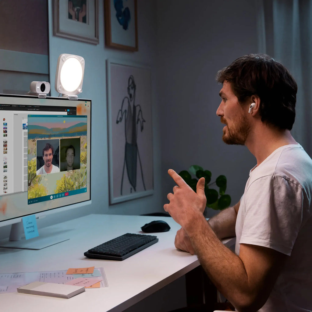 Elgato Key Light Neo bi-color LED light on a desk, adjustable brightness and color for professional streaming or video calls