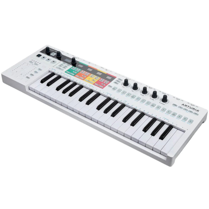 Arturia Keystep Pro sequencer with compact keyboard, control knobs, and step buttons on a black panel.