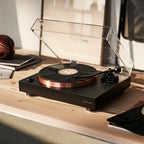 Argon Audio AURORA turntable in matt black on a wooden desk
