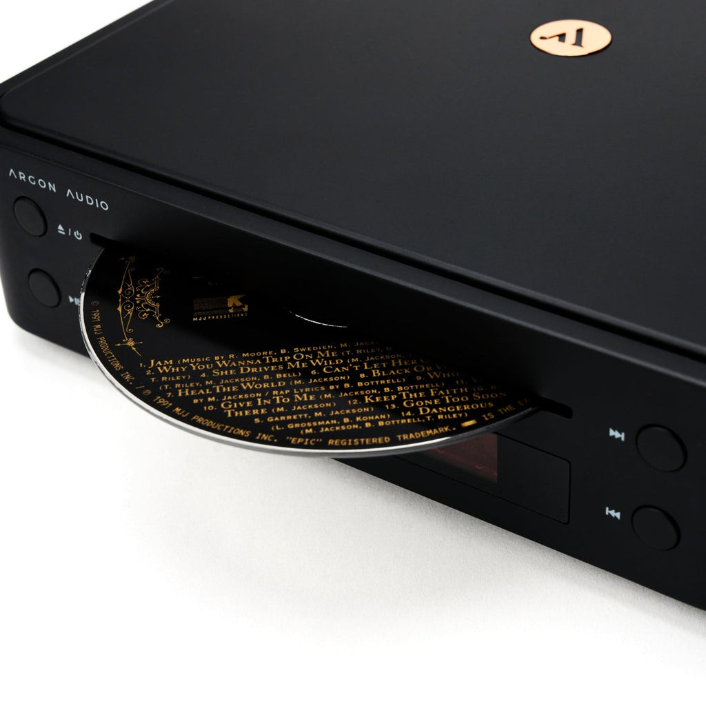 Argon Audio CD1 Black loading a disc into the slot-loading CD drive