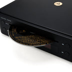 Argon Audio CD1 Black loading a disc into the slot-loading CD drive