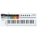Arturia Keystep Pro MIDI sequencer with multiple knobs, keys, and control buttons on a black and silver device.
