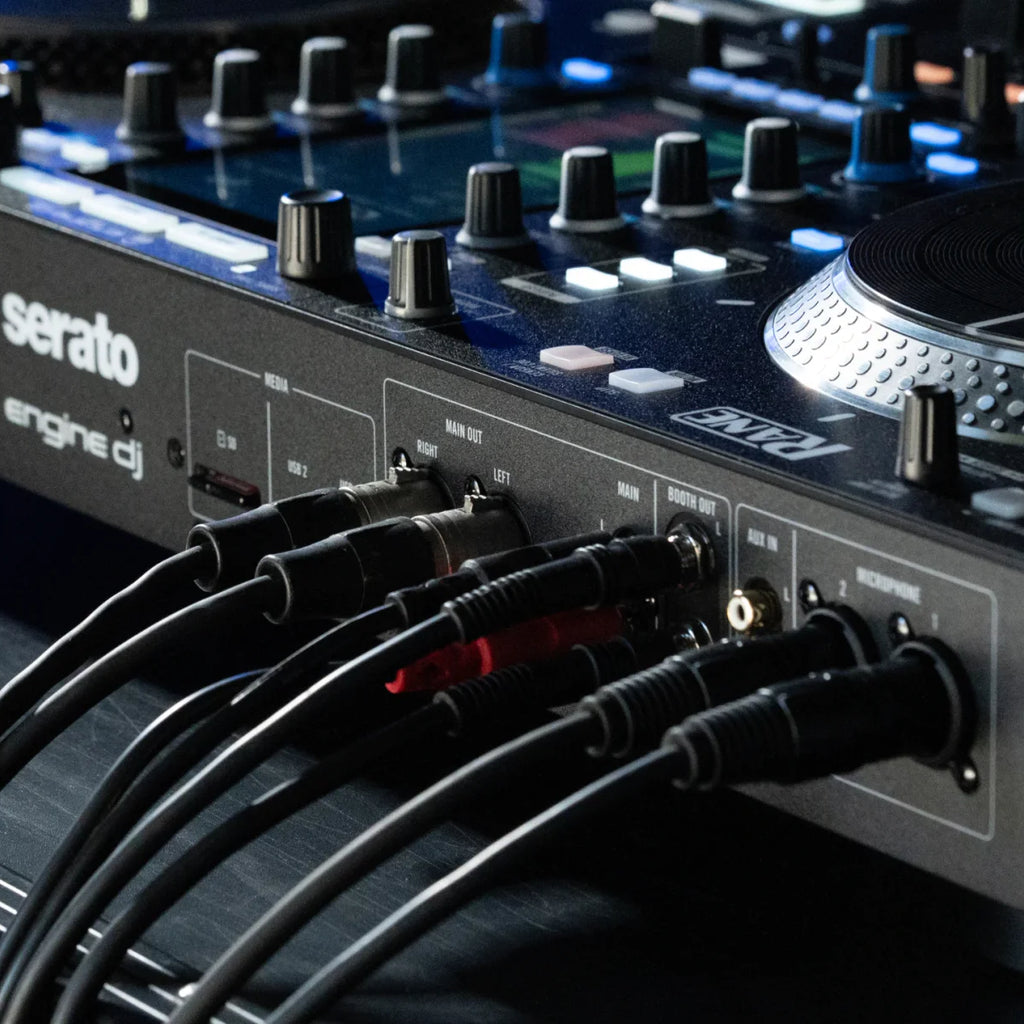 Rane System One DJ controller with jog wheels, mixer controls, and connectivity options for professional DJ setups.