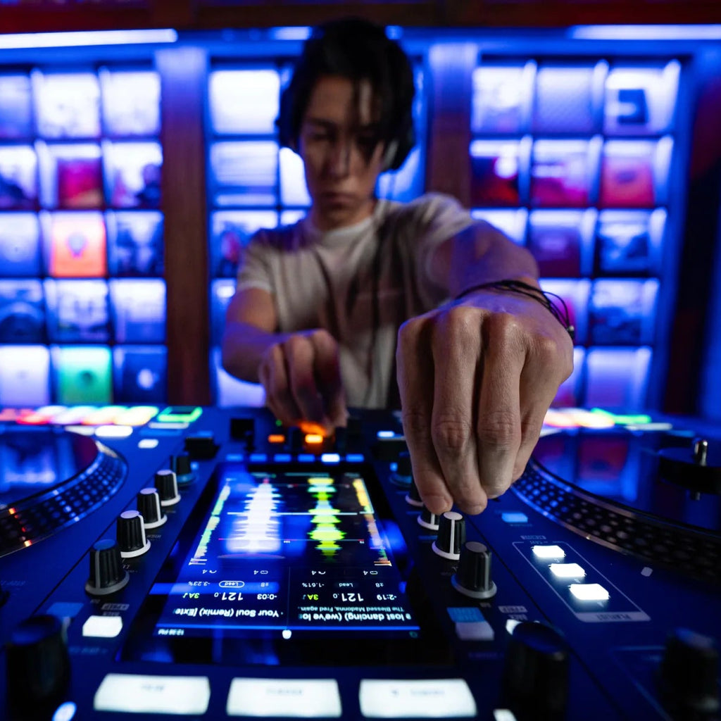 Rane System One DJ controller with jog wheels, mixers, and control buttons for professional DJ setup.
