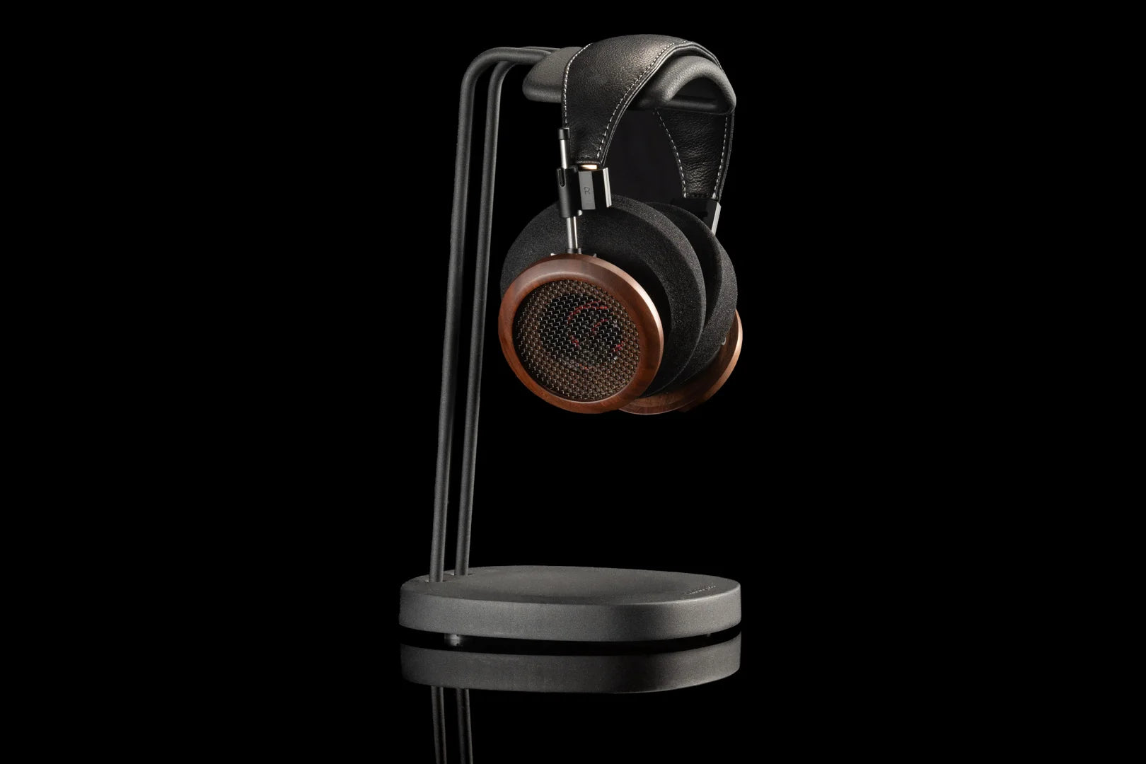 Close-up of Grado Signature S950 wired headphones featuring sleek design and cushioned ear cups, showcasing high-quality audio craftsmanship.