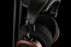 Grado Signature S950 wired headphones with over-ear design, silver finish, and adjustable headband, showing detailed ear cups and cables.