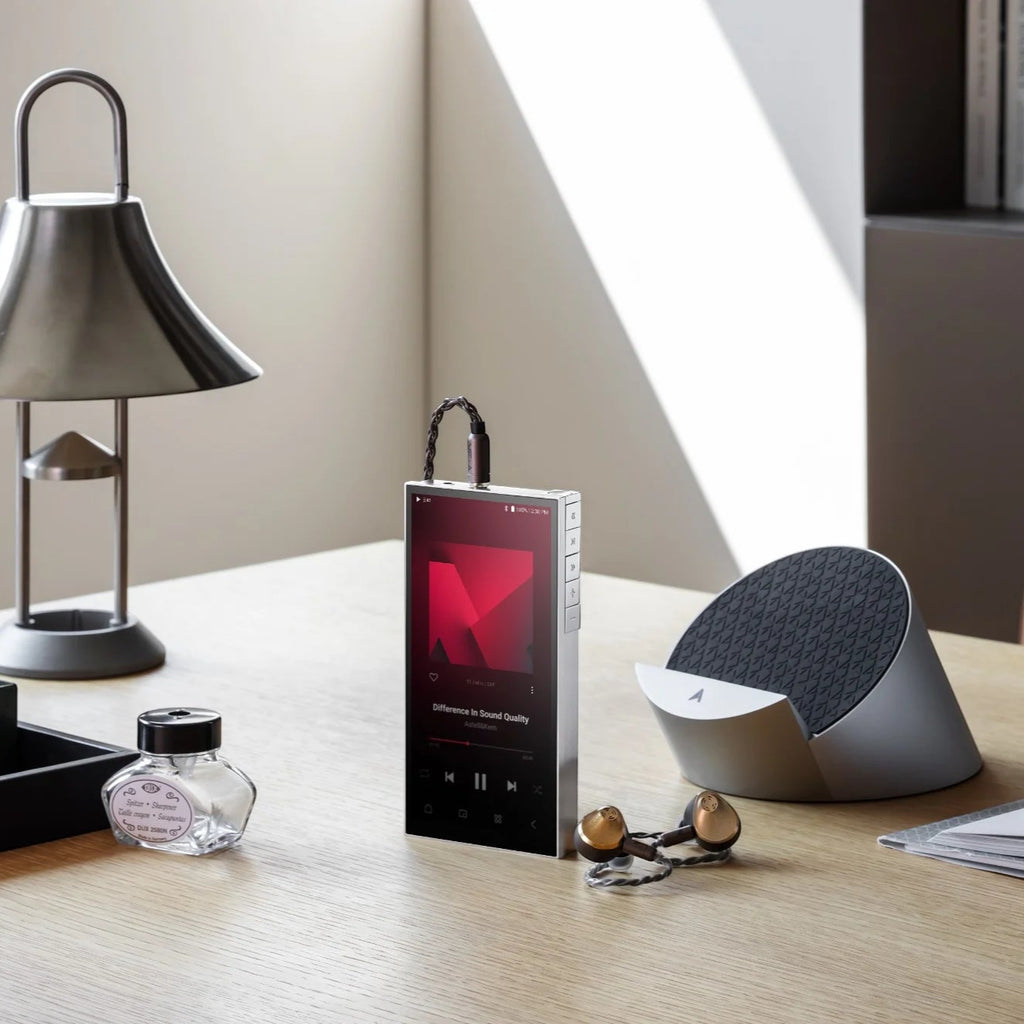 Astell&Kern PD10 portable music player with sleek black design and touchscreen display, showing music interface on the screen.