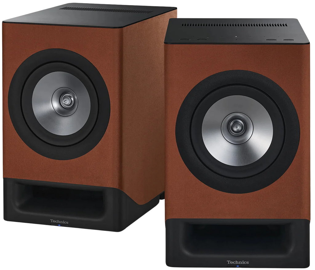 Technics SC-CX700 active bookshelf speakers with sleek black design and modern audio drivers for high-quality sound.