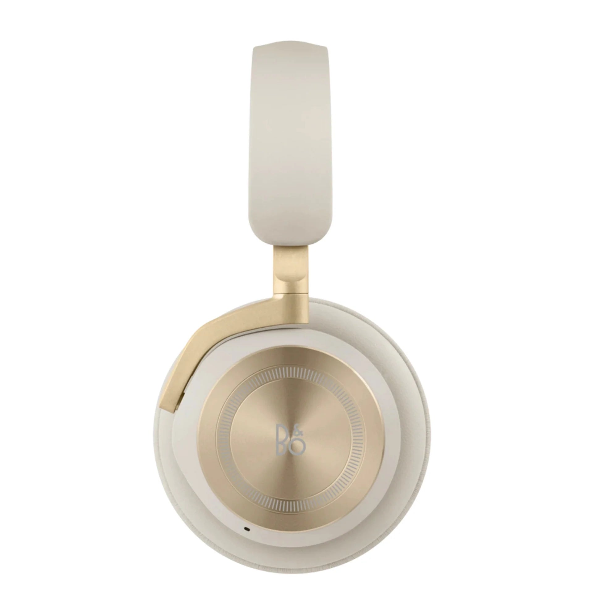 Side view of Bang & Olufsen Beoplay HX wireless headphones in gold tone, showcasing sleek design and over-ear construction.