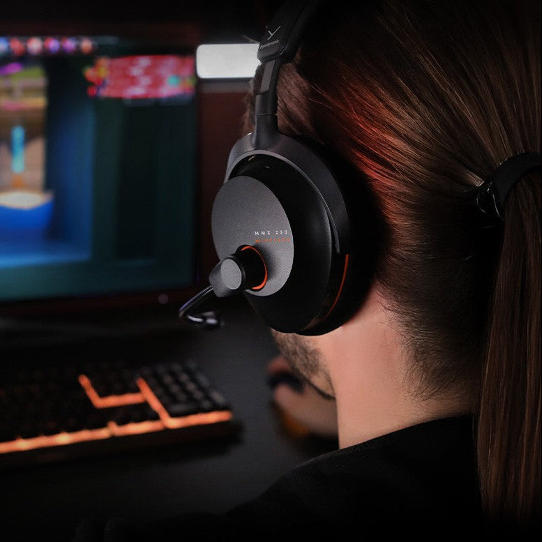 Beyerdynamic MMX 230 Wireless gaming headphones with padded ear cups and adjustable headband, black color.