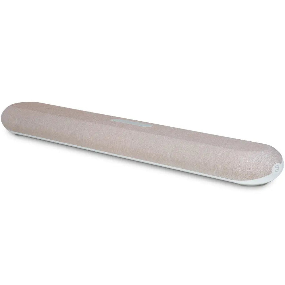 Bluesound Pulse Cinema Mini soundbar in ivory placed on a table, showcasing its sleek compact design for TV audio enhancement.