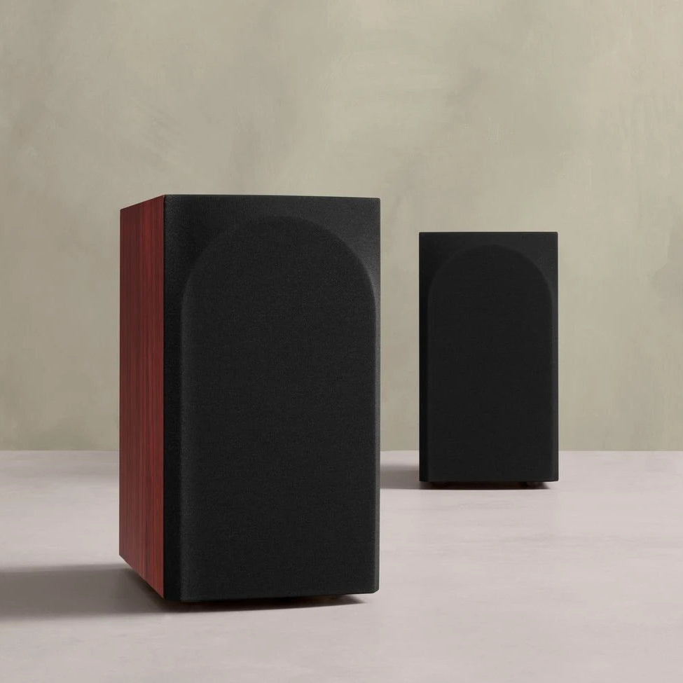 Bowers & Wilkins 707 S3 Prestige passive bookshelf speakers with sleek black cabinets and detailed driver arrangements.