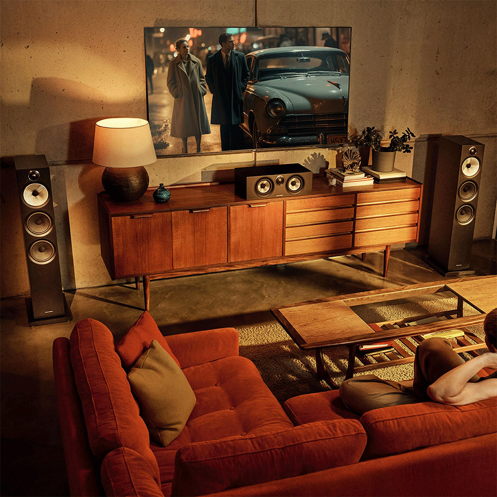 Pair of Bowers & Wilkins 603 S3 passive floorstanding speakers with sleek black cabinets and stylish grille cloths.