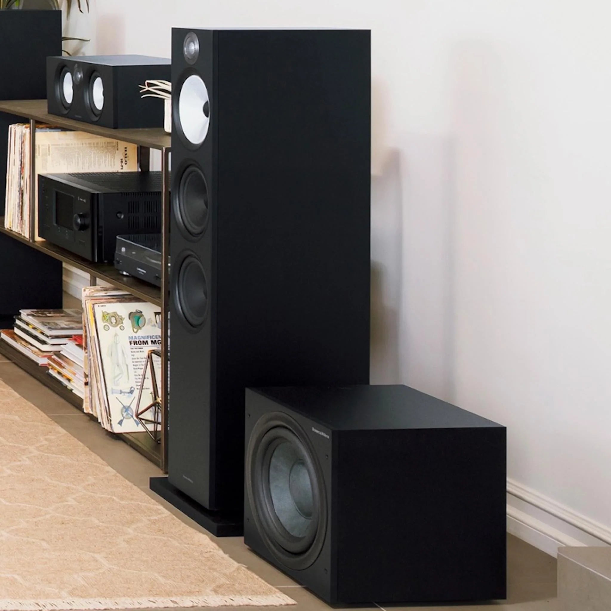 Bowers & Wilkins ASW608 subwoofer, in a room, matte black lifestyle