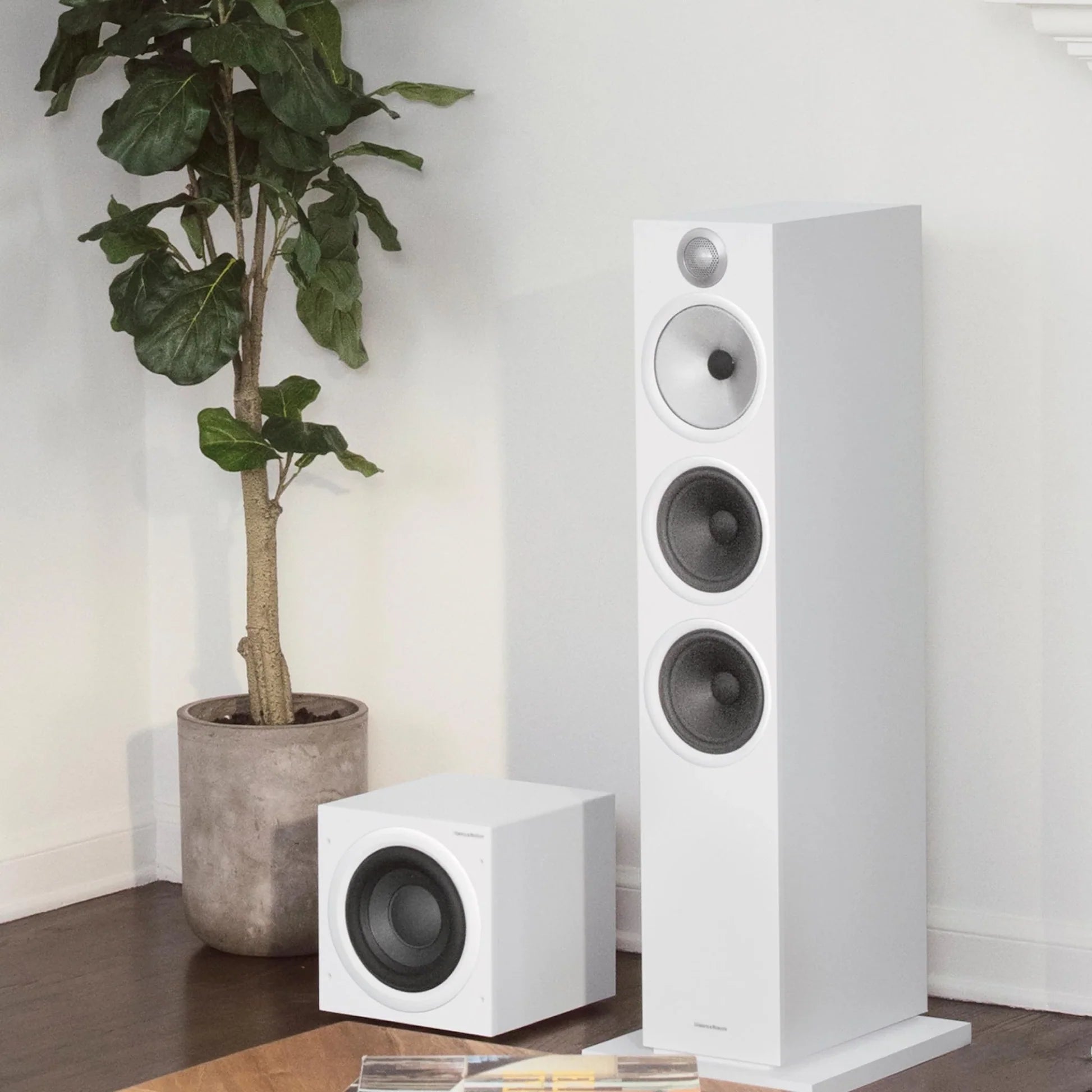Bowers & Wilkins ASW608 subwoofer, in a room, matte white lifestyle