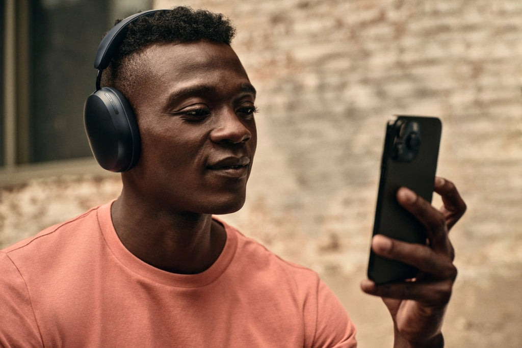 Sonos Ace wireless headphones with over-ear design, black color, and cushioned ear cups for comfortable listening.