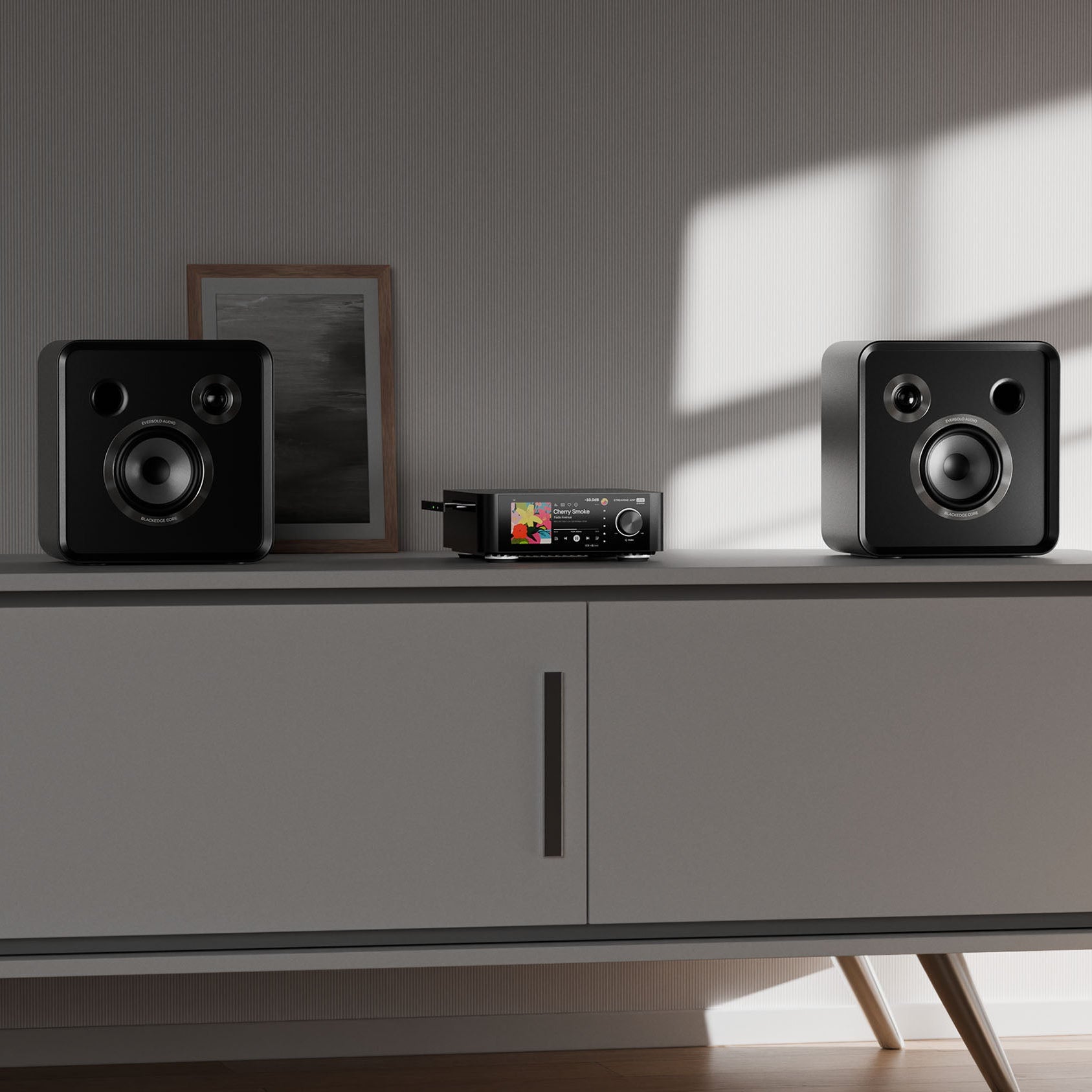 Eversolo SE100 passive bookshelf speakers with sleek black finish and compact design, ideal for home audio systems.