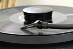 Close-up of Ortofon Concorde Music Black turntable cartridge mounted on a Pro-Ject turntable.