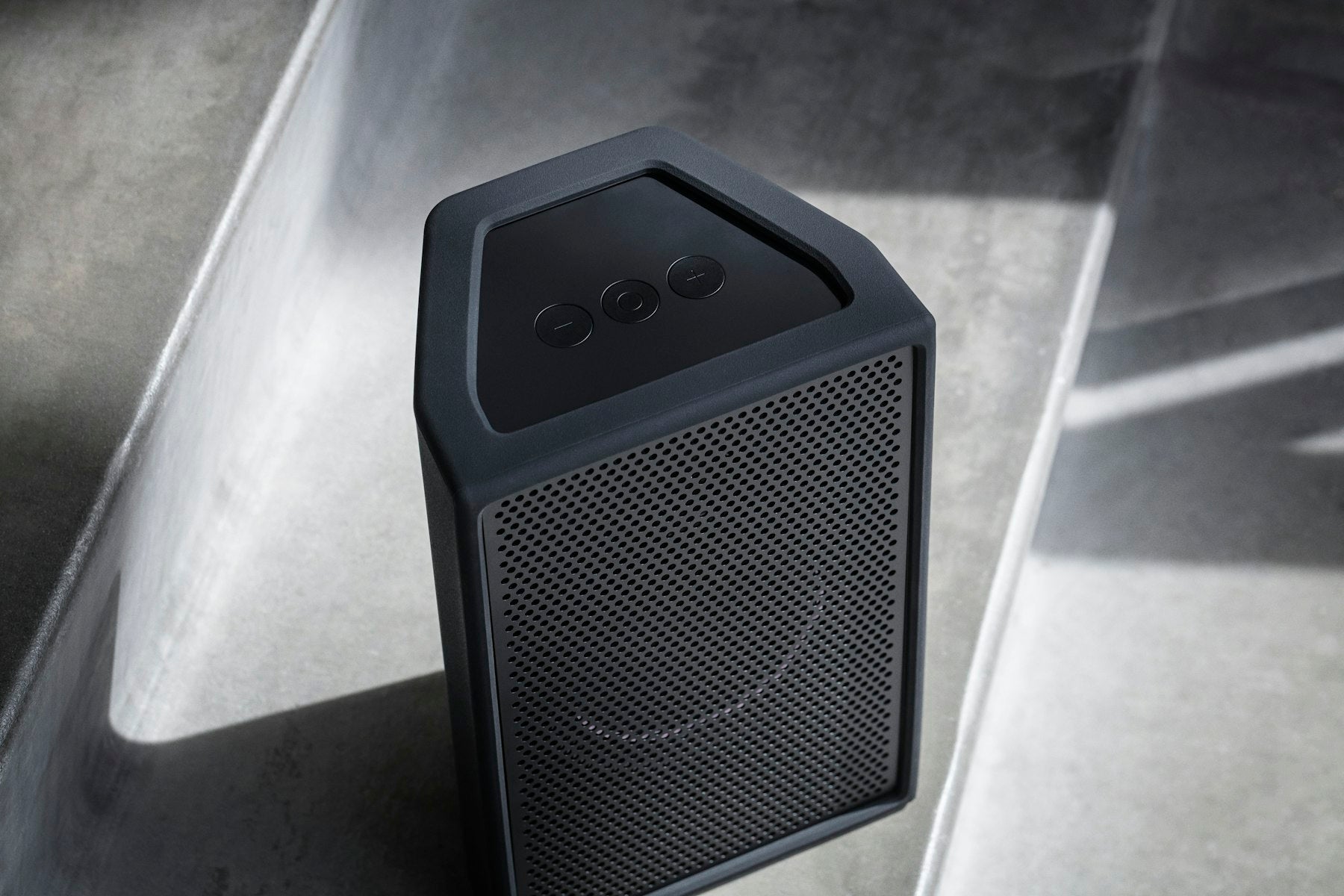 AIAIAI UNIT-4 Wireless+ active nearfield monitors showing sleek black speakers with control knobs on a studio desk.
