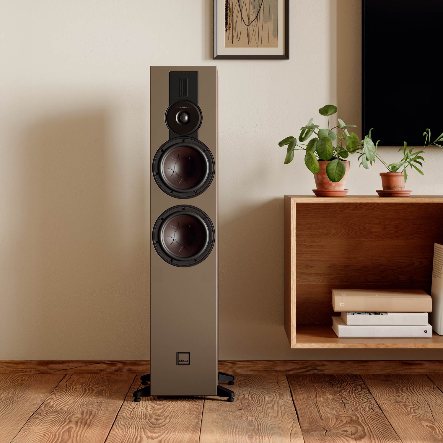 DALI Sonik 7 passive floorstanding speakers with sleek black cabinets and dual midrange drivers for high-quality sound.