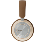 DALI Dali iO-8 wireless headphones in caramel white with cushioned ear cups and sleek design.