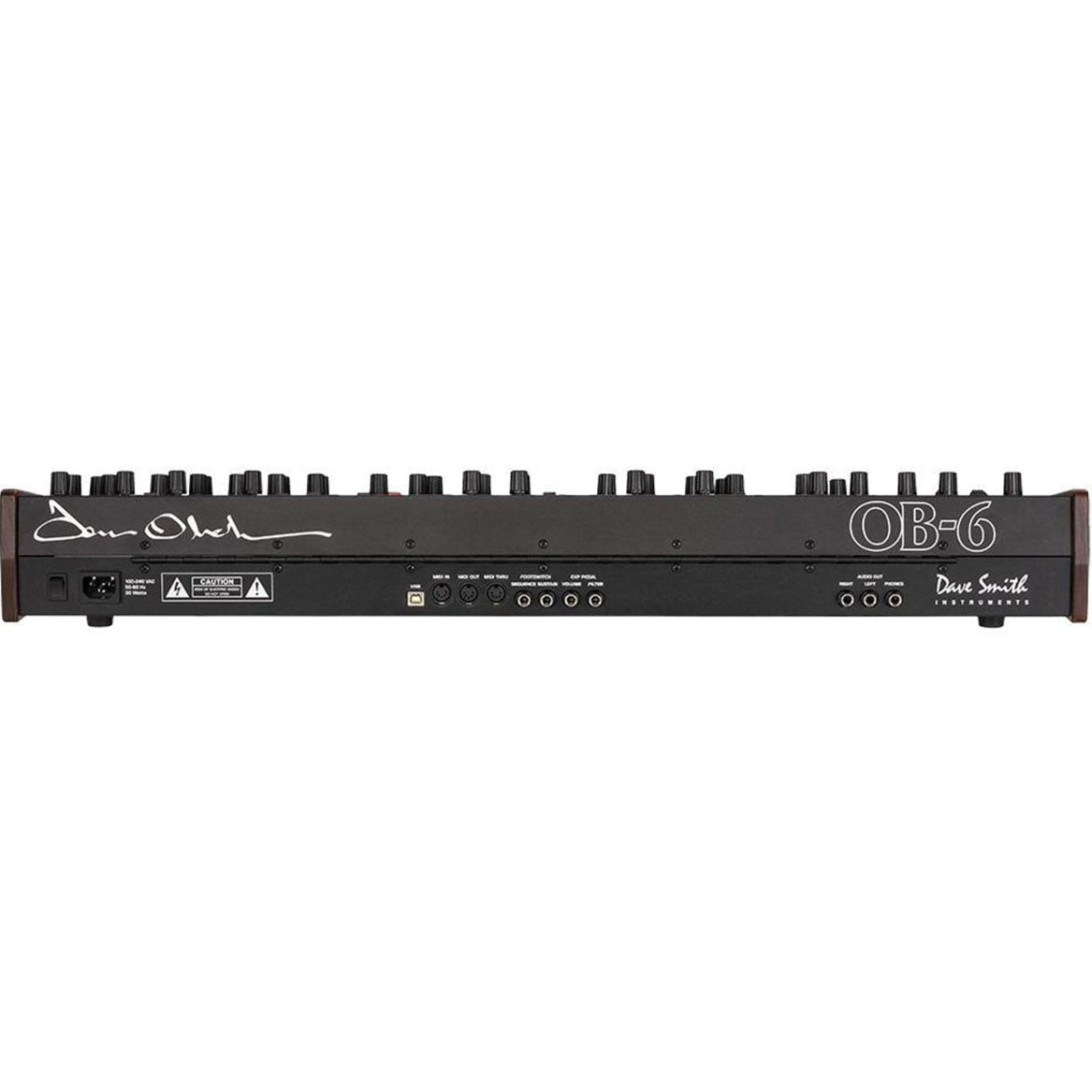 Sequential OB-6 synthesizer with a sleek control panel and knobs, designed for rich, analog sound production.